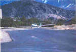 Motorglider on 99V runway for training flights. Crawford airport welcomes pilots and aviation enthusiasts. 
